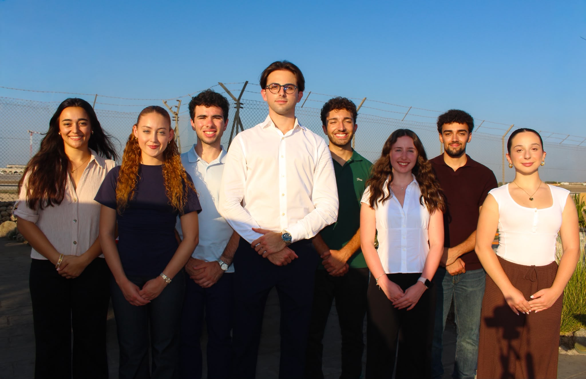The UM AERO executive committee together at an airfield